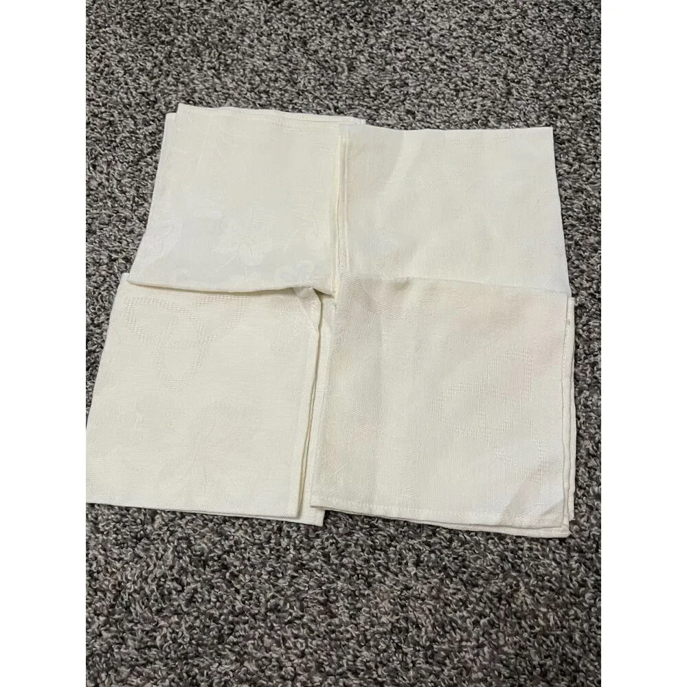 4 ivory damask dinner napkins with subtle leaf pattern